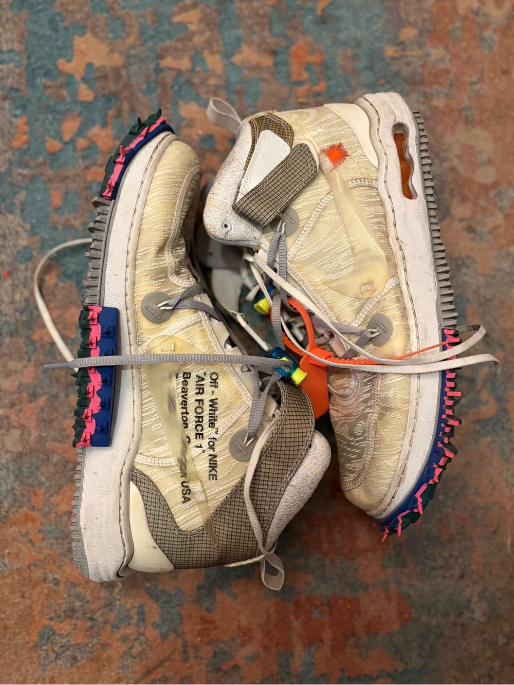 Off-White x Nike Beige Trail-Inspired Sneakers with Pink & Blue Accents